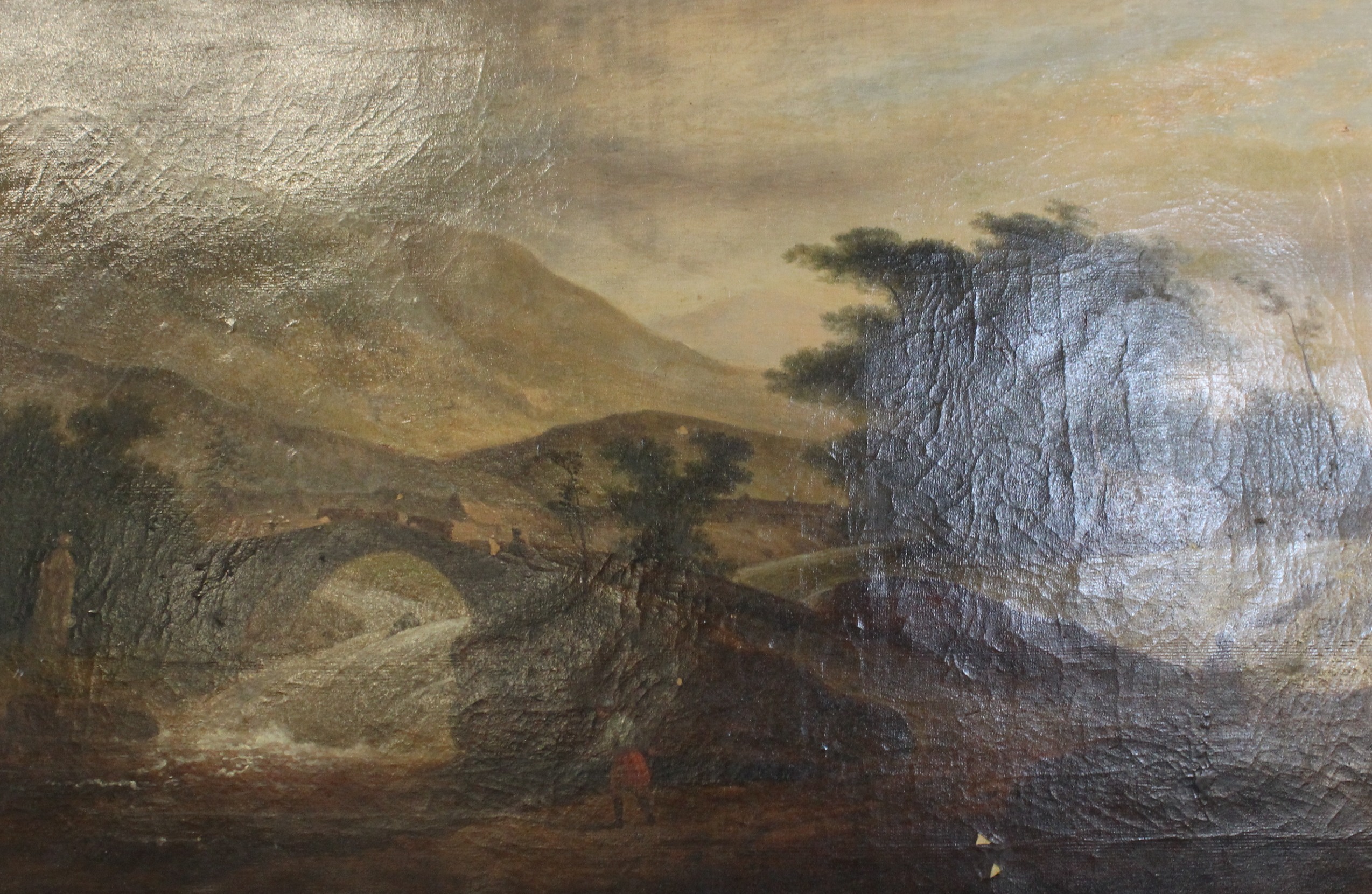 19th Century SchoolBridge with figures with mountains in the distanceOil on canvasUnsigned 44.5cm