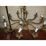 A gilt metal ten light chandelier, 20th century 88cm diameter