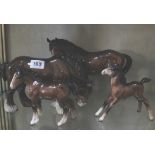 A Beswick model of a shore horse grazing, a model horse and two foals (4)