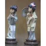 Two Lladro figures of Geisha's, 28cm and 26cm high (2)