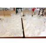 A mixed lot of cut glass, decanters, vases, wine glasses, tumblers etc