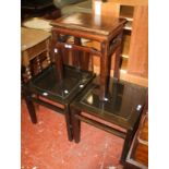 A pair of bedside tables, and a Chinese hardwood table