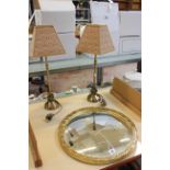A pair of modern lamps and a gilt decorated convex mirror (sold as parts)