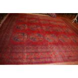 An Afghan carpet 310 x 360cm Property of the owners of the Downton Estate, Shropshire