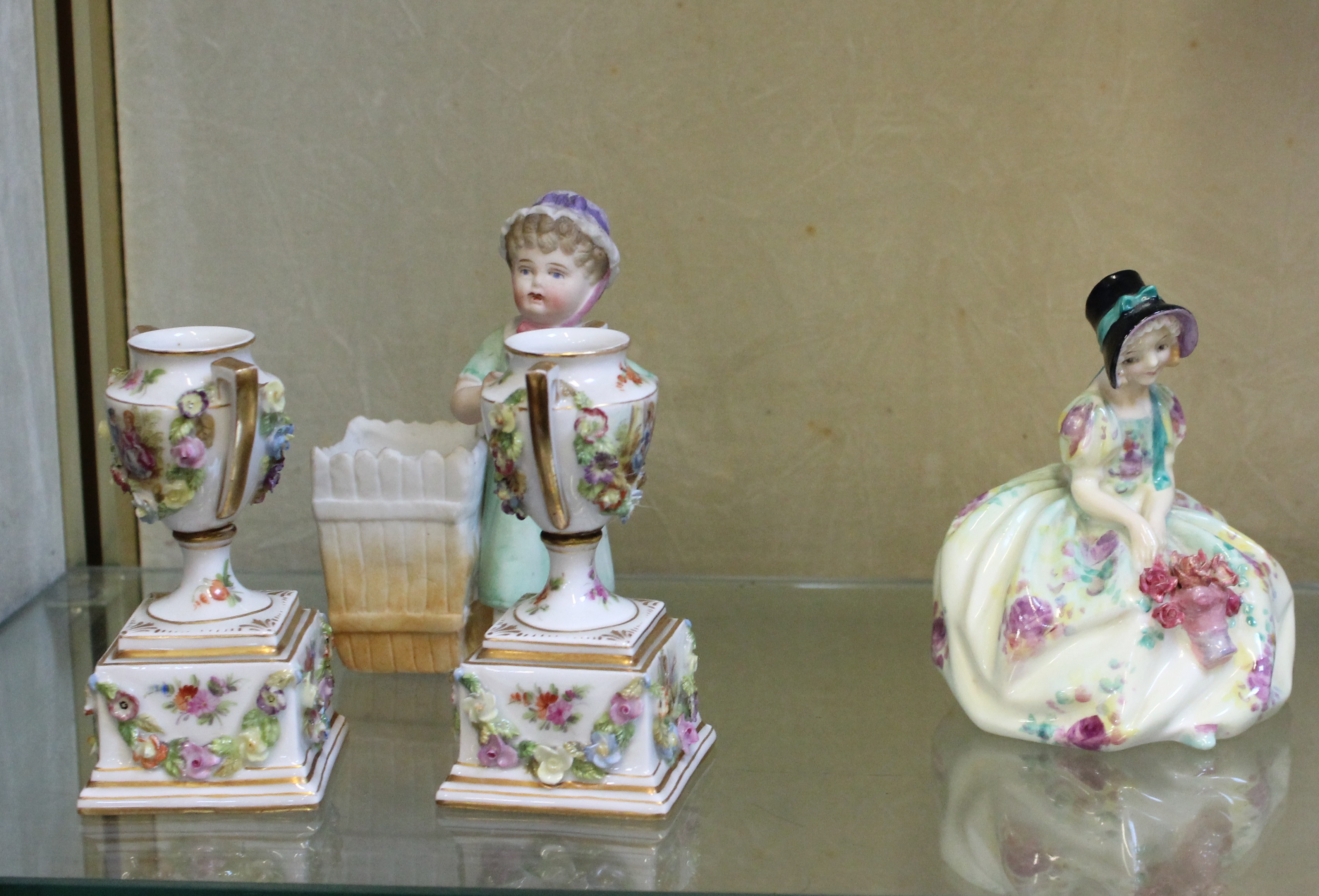 Royal Doulton 'Monica' RdNo. 762875, another figurine and a pair or miniature encrusted urns (4)