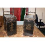 Two Chinese gilt and japanned boxes decorated with landscapes and script each 66cm high, 49cm deep