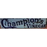 A Champions Vinegar enamel sign by Evans of Wolverhampton, 180cm x 41cm