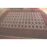 A Turkish rug 330 x 230cm