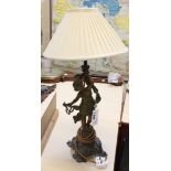 A figural spelter lamp with cream shade (sold as parts)