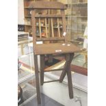 A beadwork footstool and a child's folding chair