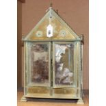 A French miniature armoire/jewellery box in brass, mirrored doors and hidden compartment