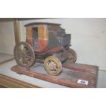 A wooden model carriage, 21cm high