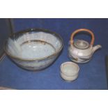 Colin Kellam (b. 1942), a stoneware deep bowl, 17.5cm high, 31cm diameter; a tea pot and cover, with