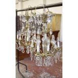 A pair of gilt metal & glass mounted chandeliers