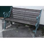 A garden bench with painted supports