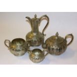 A Roberts and Belk silver plate four piece tea service in an Arabic design with serpent handles.