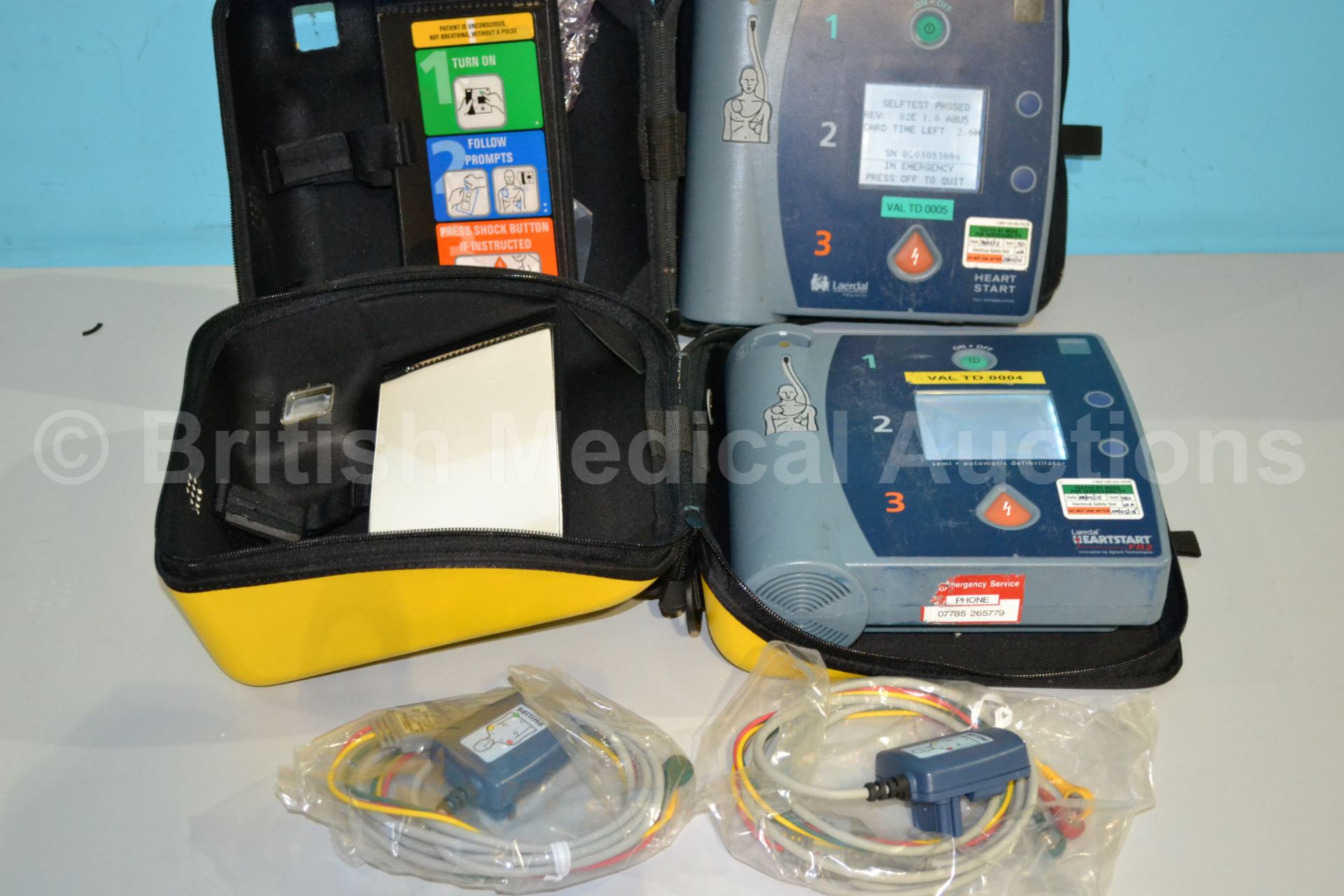 2 x Laerdal Heartstart FR2 Defibrillators in Yello