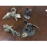 Cast fantasy figures including dragons