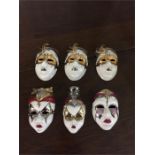 Six decorative masks