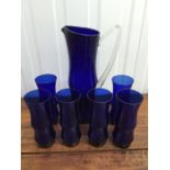 Elegant blue water jug and six glasses