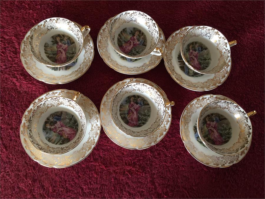 6 Couple scene gilded cups and saucers by Stanley