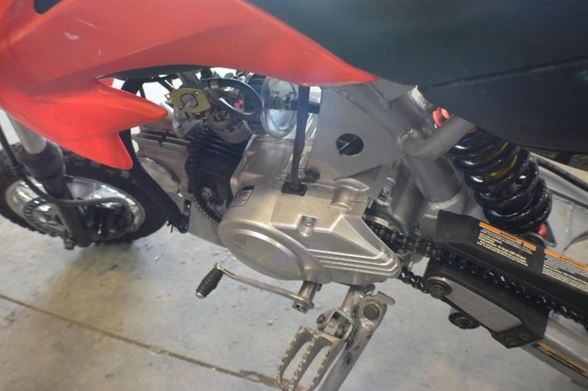 Dirt Bike 70cc 4 Stroke Red/Black Color. Key is missing . This unit is for EXPORT ONLY. Buyers ackno - Image 7 of 7