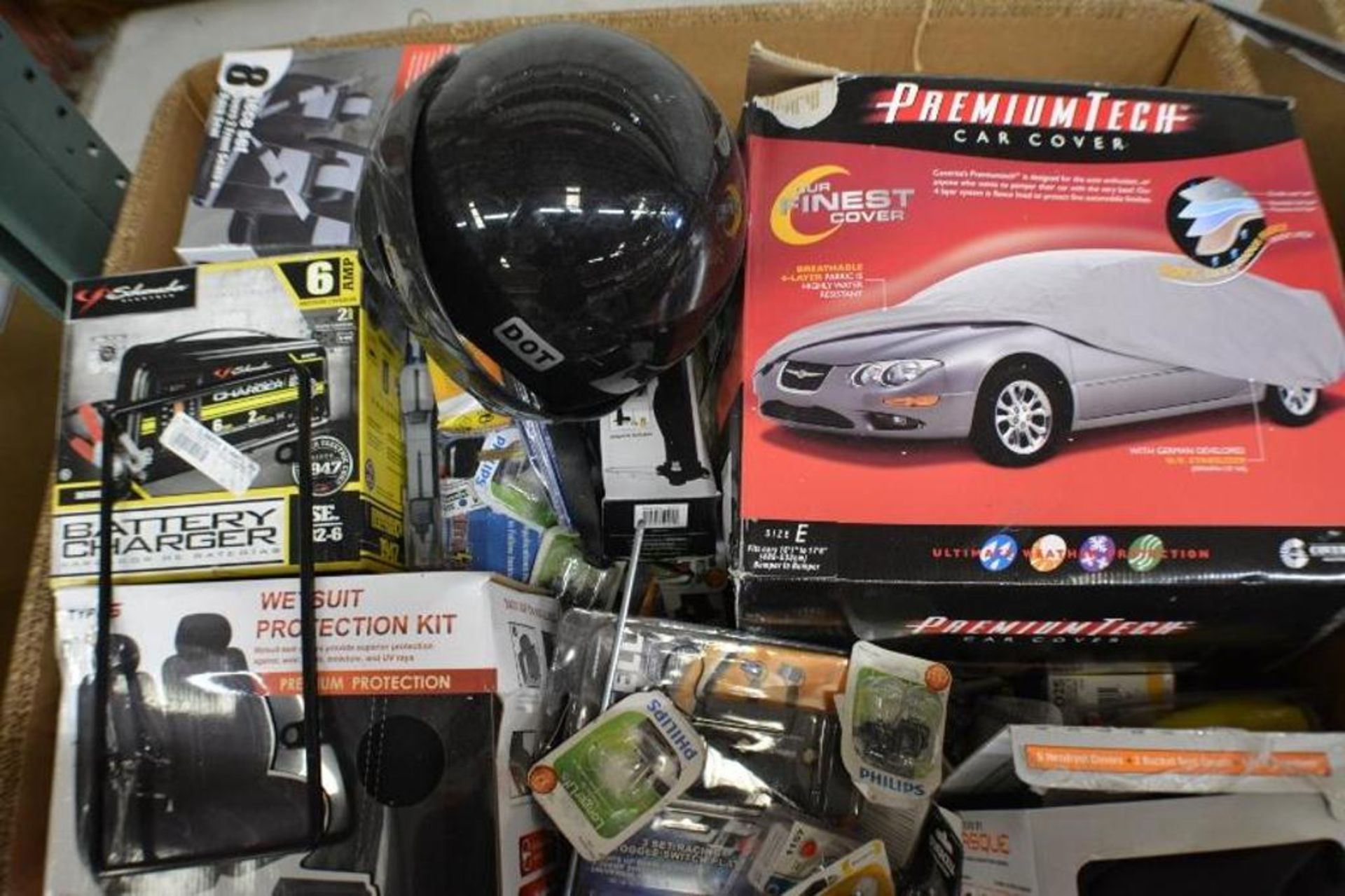 Car Accessories. Assorted Car Accessories + Assorted Sizes Hitches + Jump Starter + Seat Covers + Ba