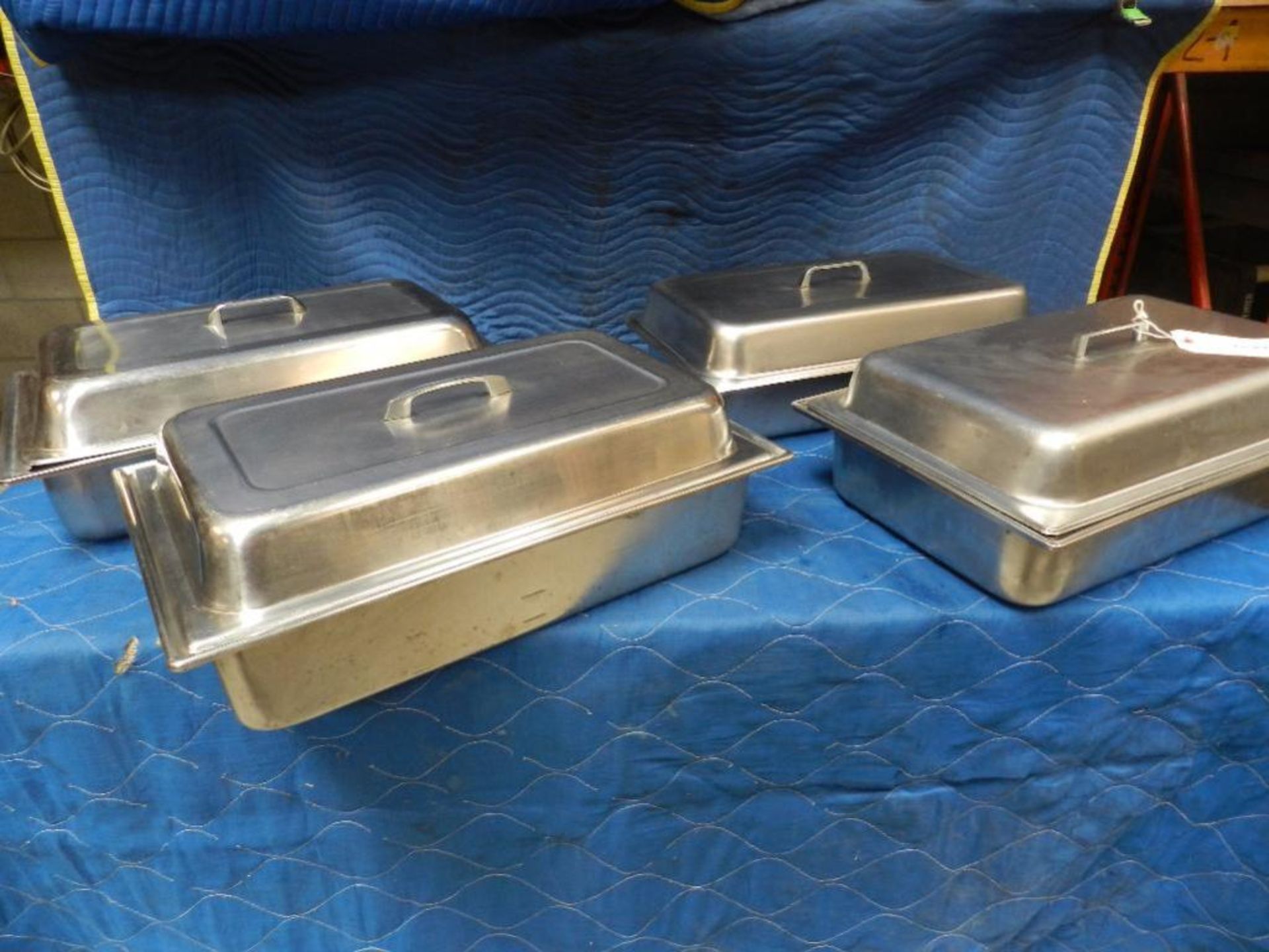 Trays with lid. insert type trays with lid seems stainless steel. Qty 4. Sold highest bid sought X 4
