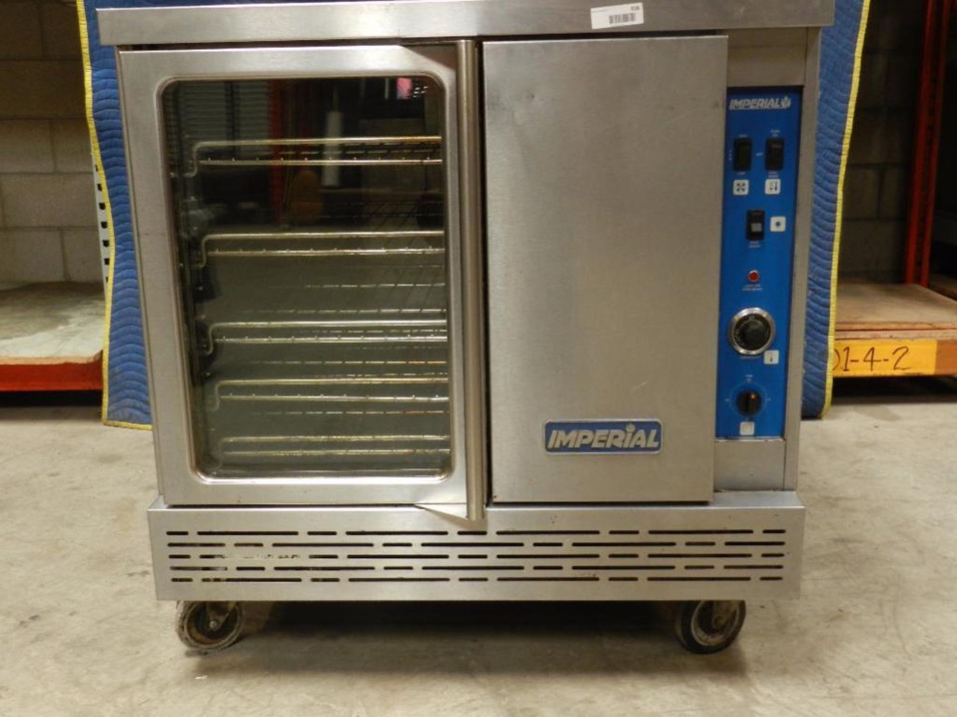 Oven. Convection Oven. Imperial make. Stainless Steel Model ____ Single Dr. Approx Size 4ft. x 3 ft.