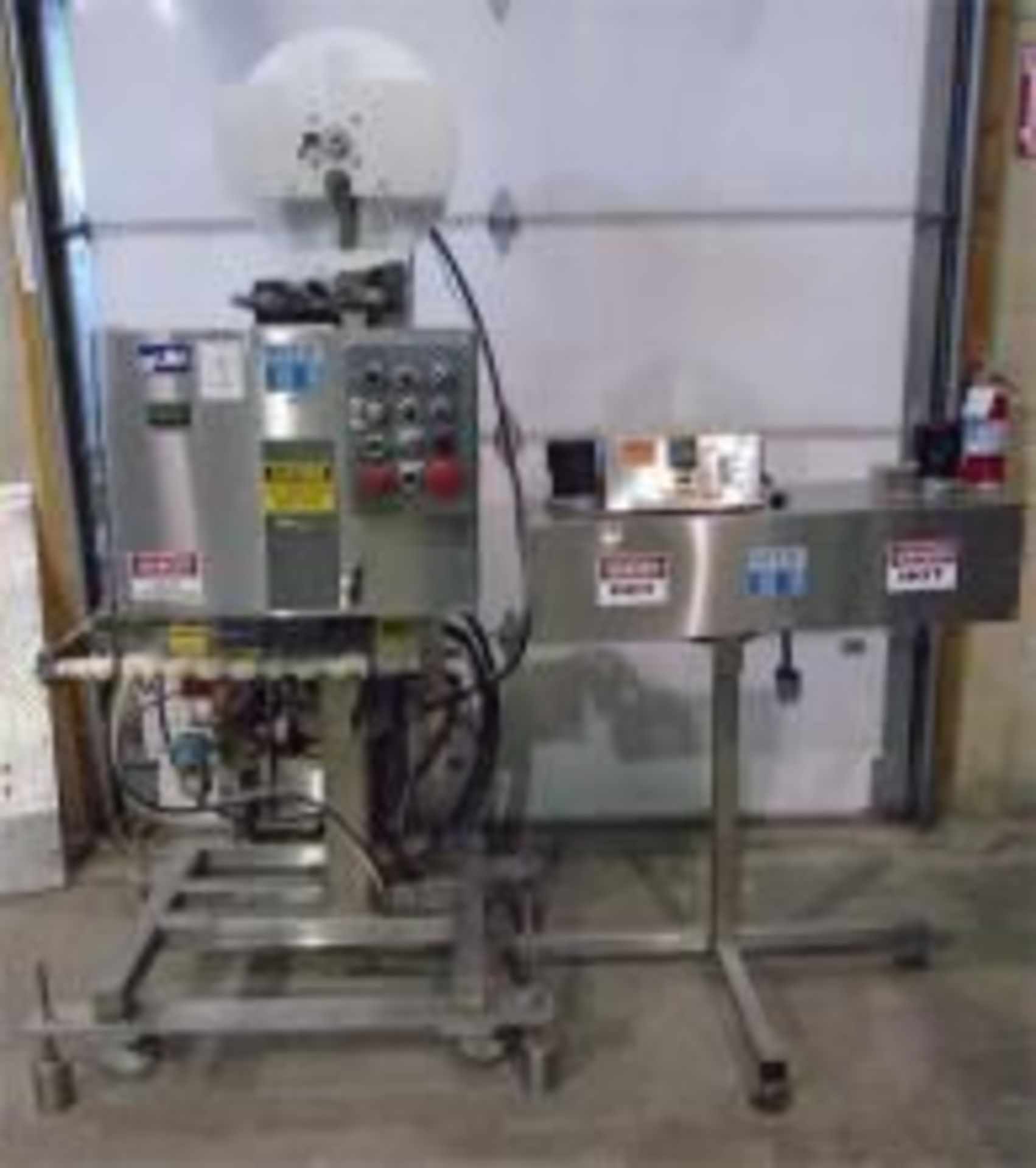 Used PDC Neck Bander Sleever Model 40-M. Electrics:1Ph/60Hz/240V.  Includes: 3’L x 5”W Heat Tunnel