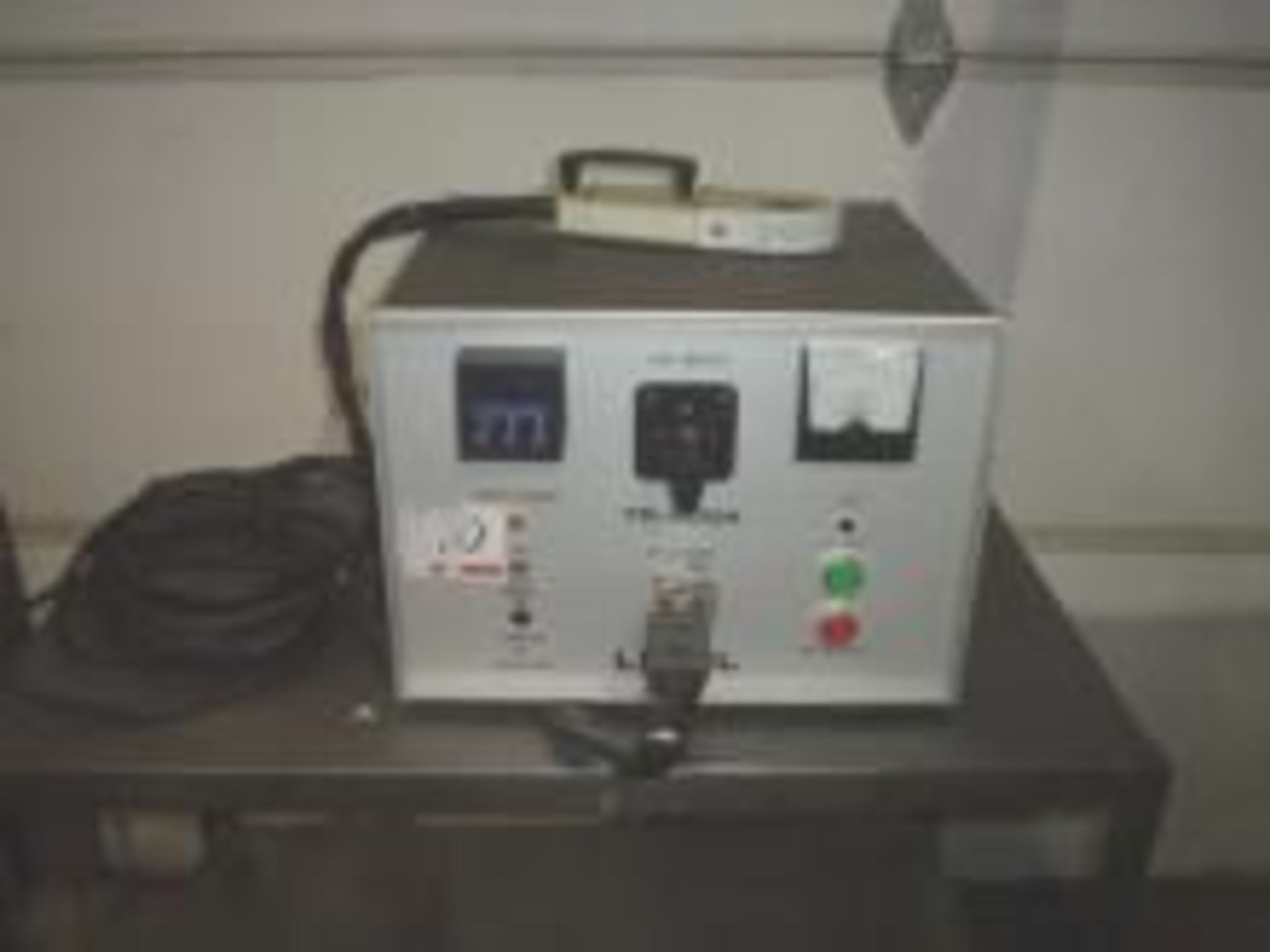 Used Lepel Table Top Heat Induction Sealer, Model TR300A.   Electrics: 1/60/115 volts. Load Out