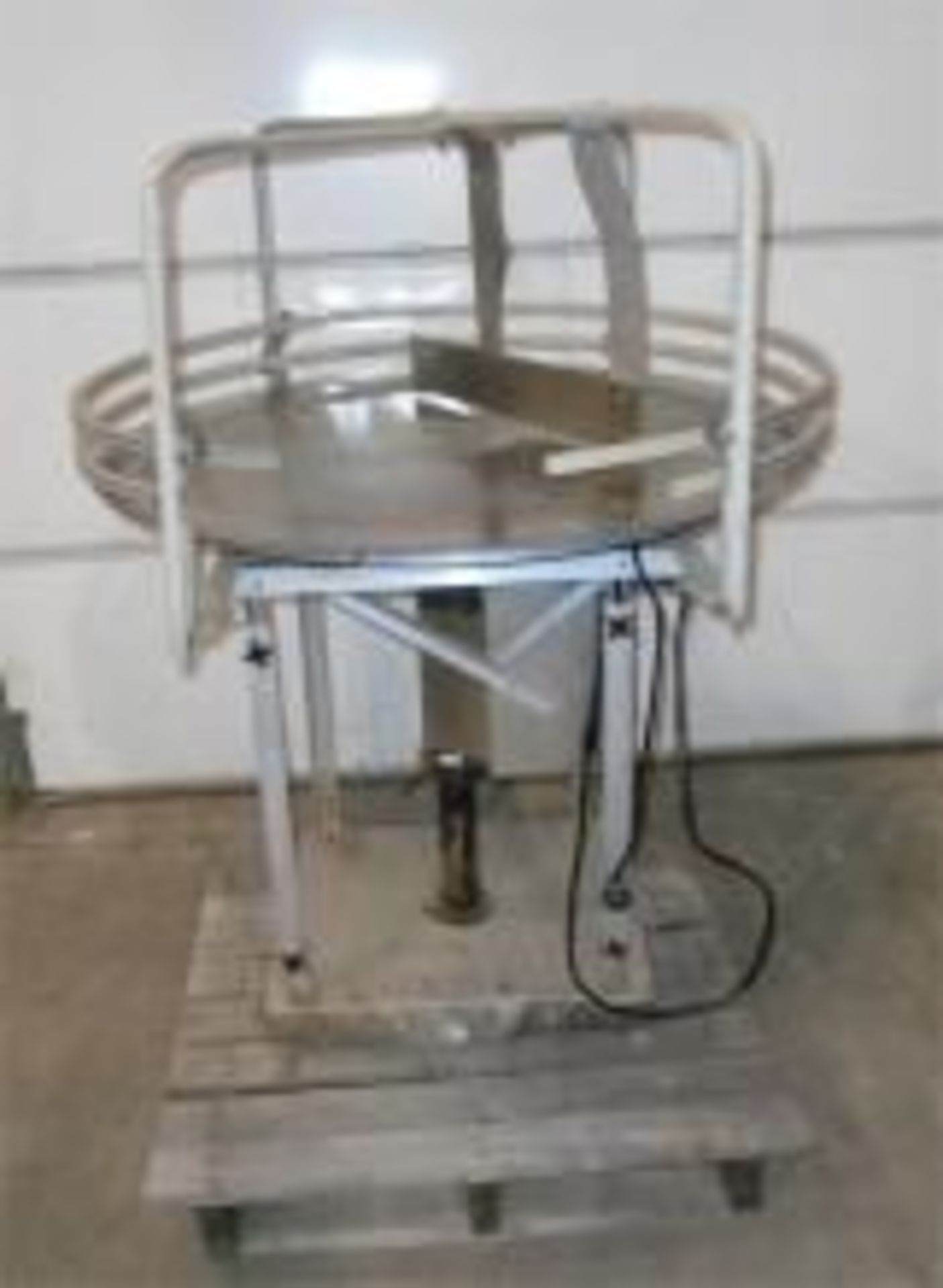 Used 42" Stainless Steel Infeed Turn Table. Heght Adjustable Electrics: 1Ph/60Hz/110Volts Load Out