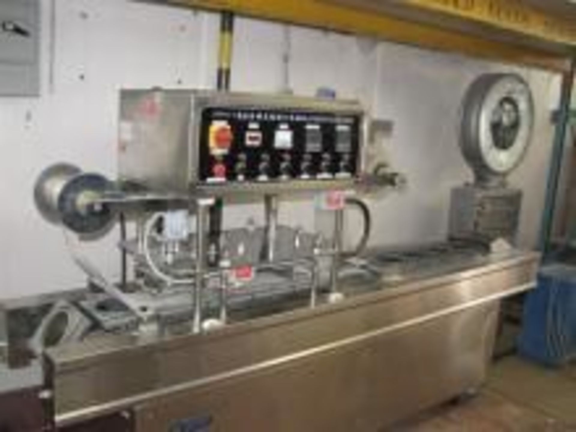 Used Weizuo Packaging Tray Sealer Model HF-900-C.  Electrics: 3Ph/60Hz/220Volts. Load Out Fee:200