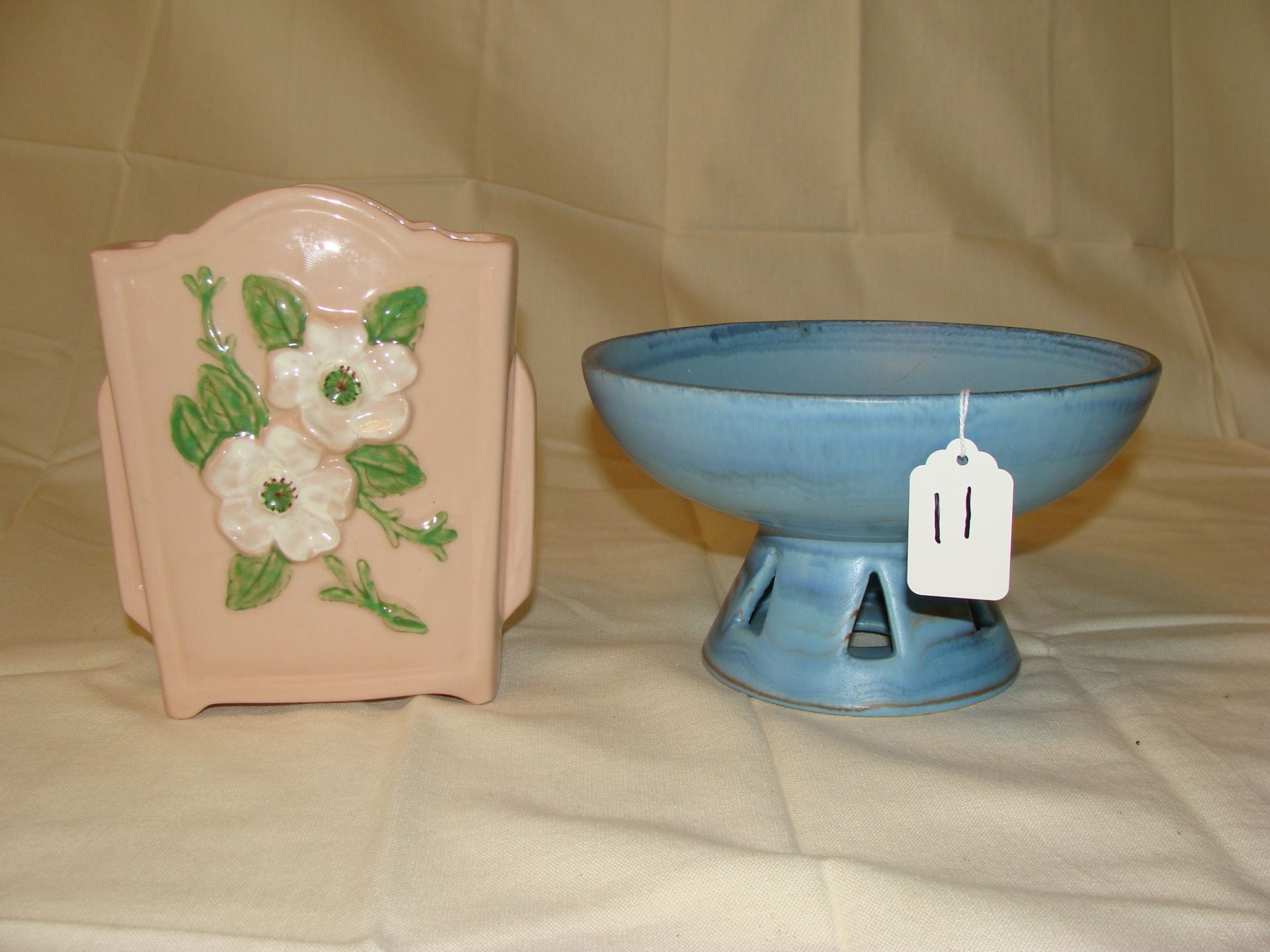 Two Pieces of Potterry: Hull Flower Vase and A Haeger Footed Bowl