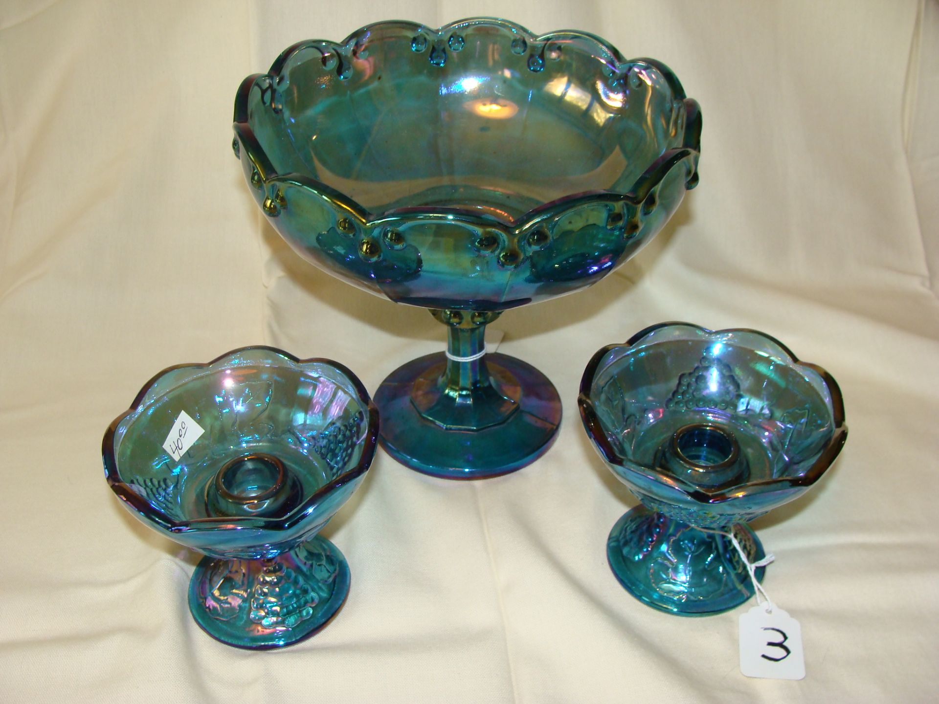 Pair of Carnival Glass Candle Sticks and Footed Bowl