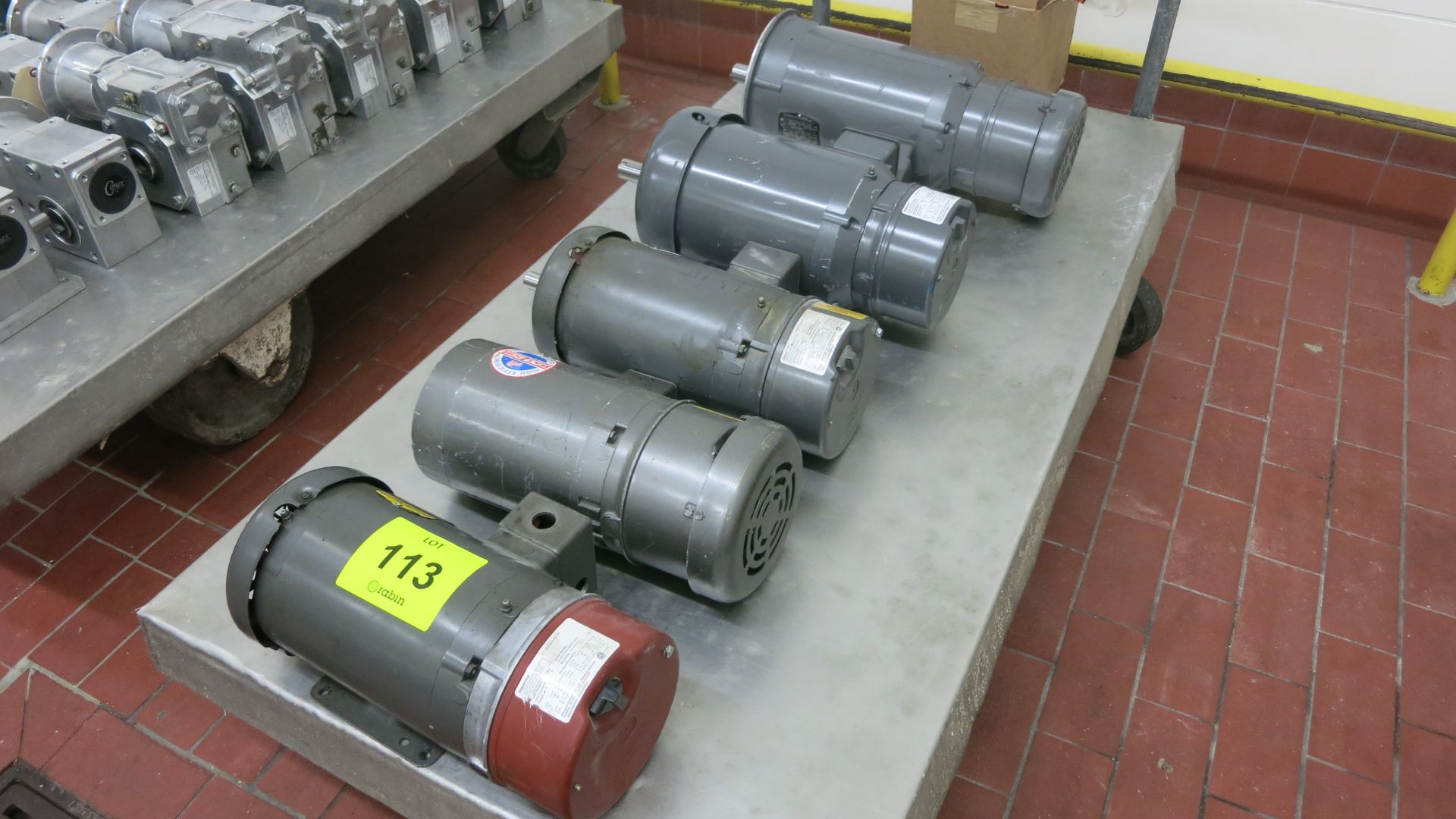 [Lot] (5) Motors, (1) 5 hp, (1) 3 hp, (1) 1.5 hp, (1) 1 hp (contents on cart, no cart)