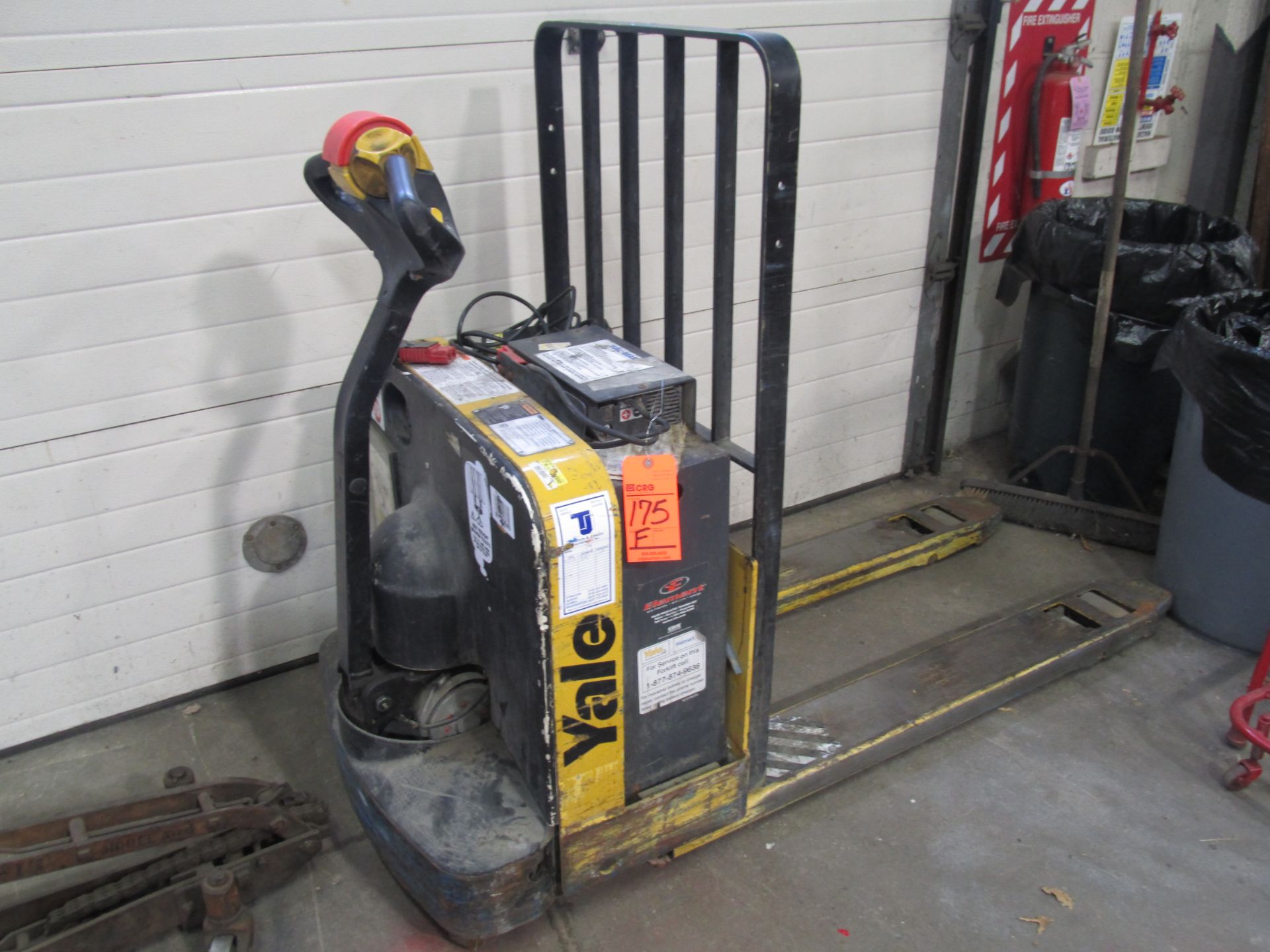Yale m/n MPW959-EN24T2748 electric pallet jack, 24 volt, 5000 lb. capacity w/built-in/mounted charg