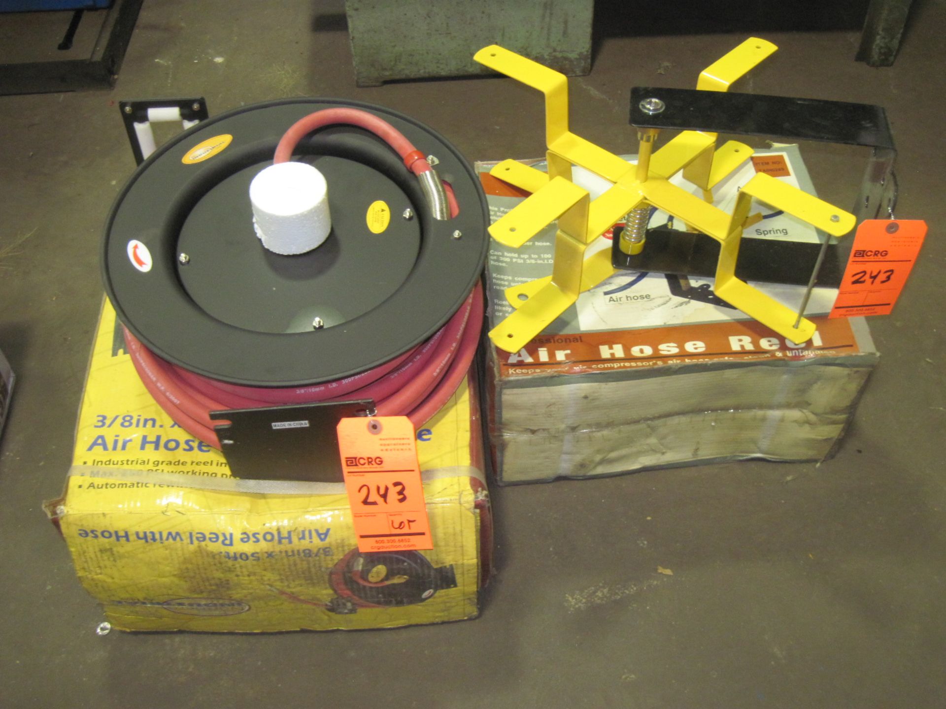 Lot of (2) air hose reels, (1) with hose