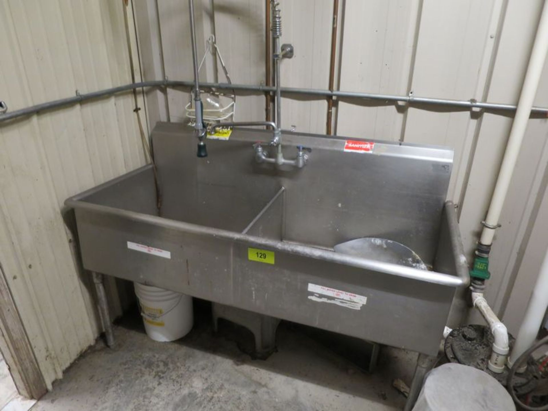 Stainless sink, double basin (located in chiller closet directly across from back door)