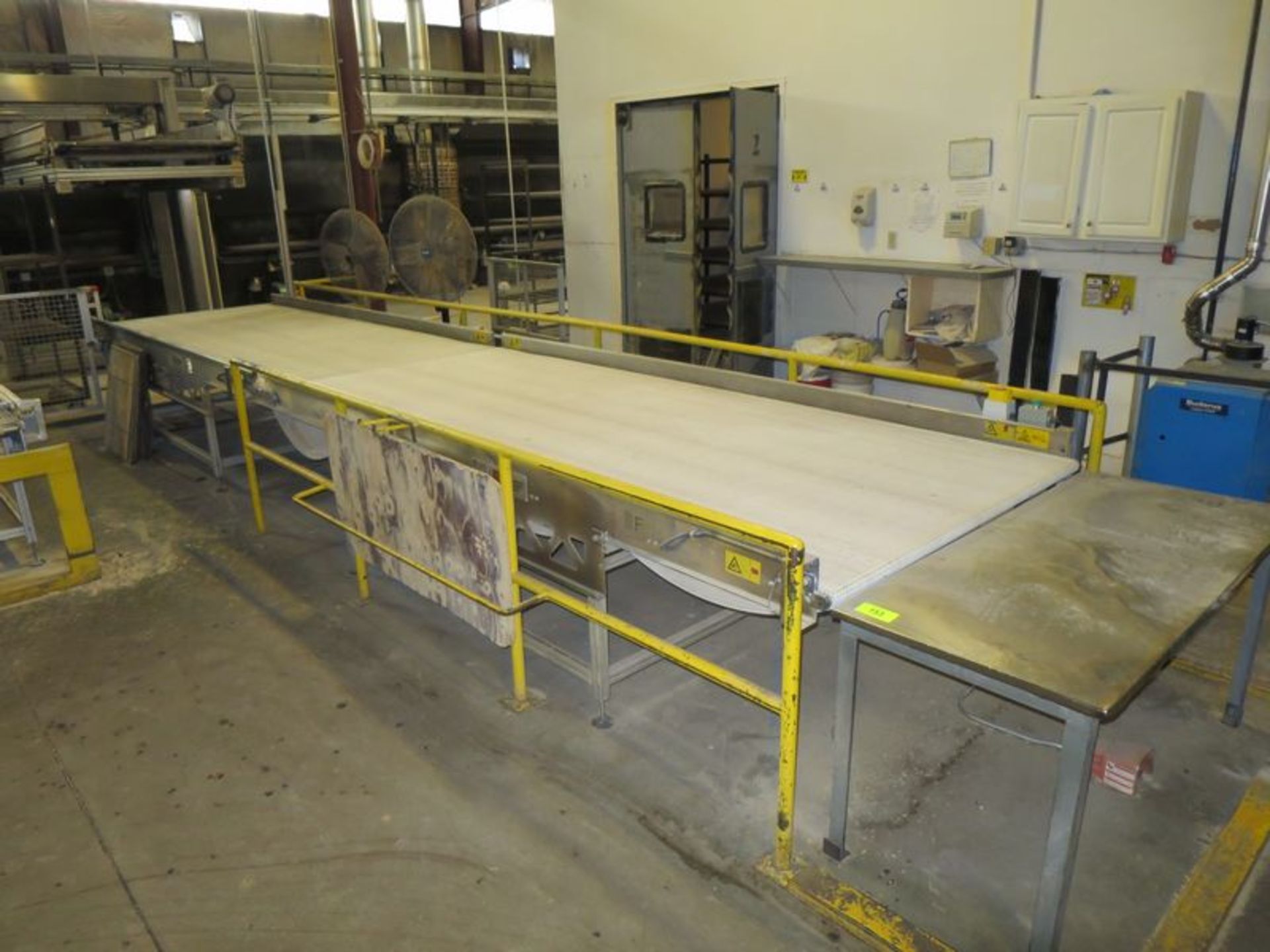 Marden discharge belt from unloader, 24' x 55" wide, with servo drives, hand and foot controls
