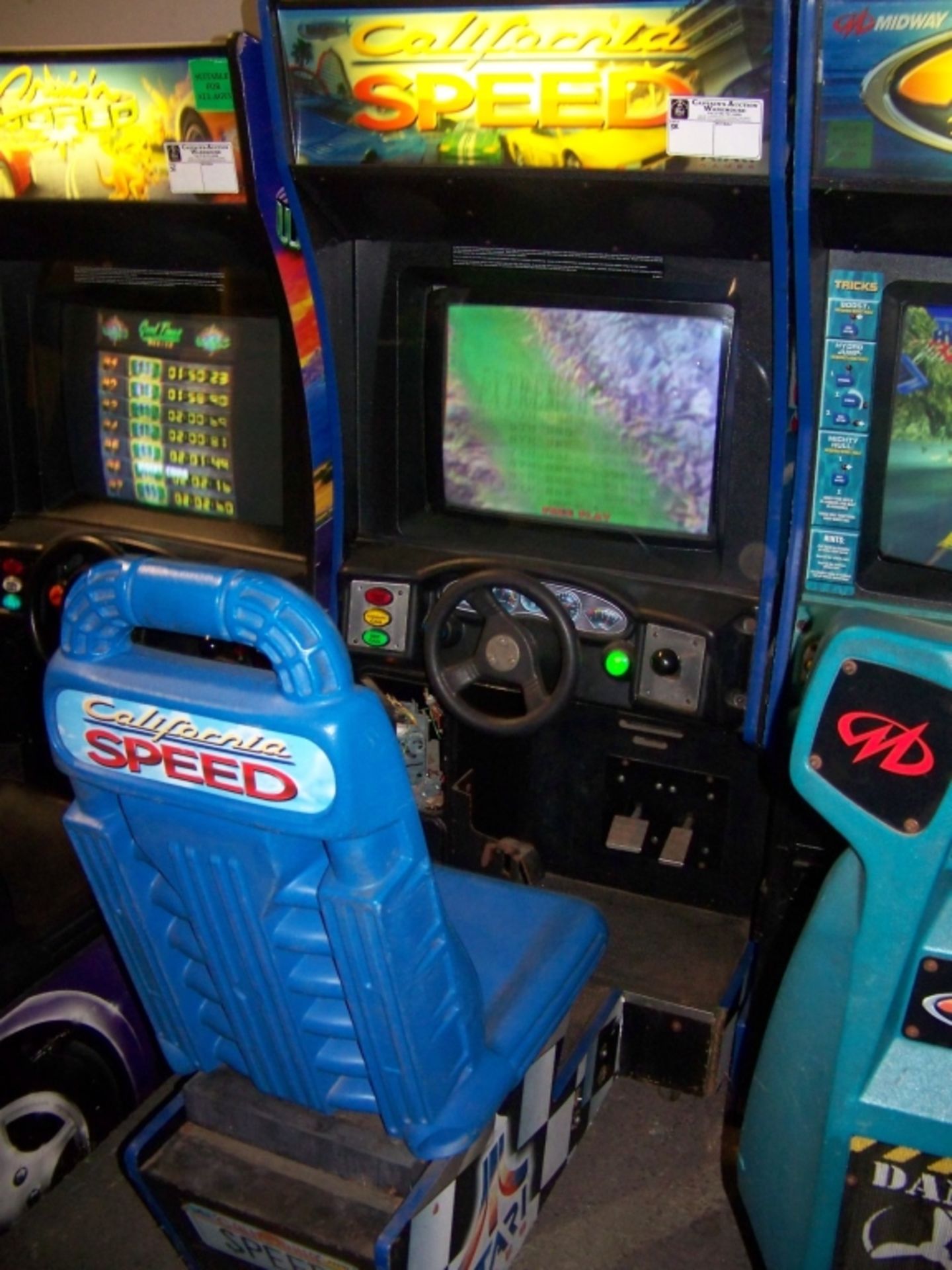 CALIFORNIA SPEED SITDOWN ARCADE GAME Item is in used condition. Evidence of wear and commercial