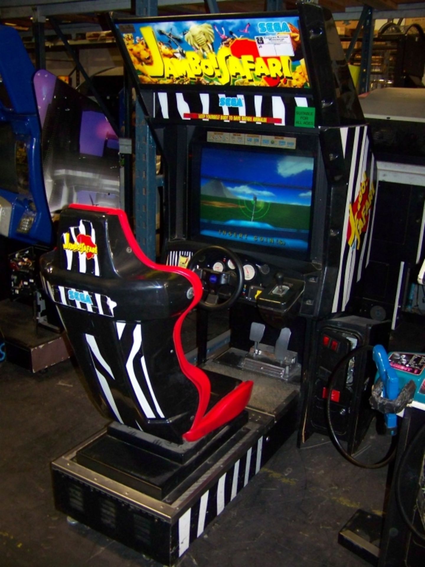 JAMBO SAFARI SITDOWN DRIVER ARCADE GAME SEGA NAOMI Item is in used condition. Evidence of wear and