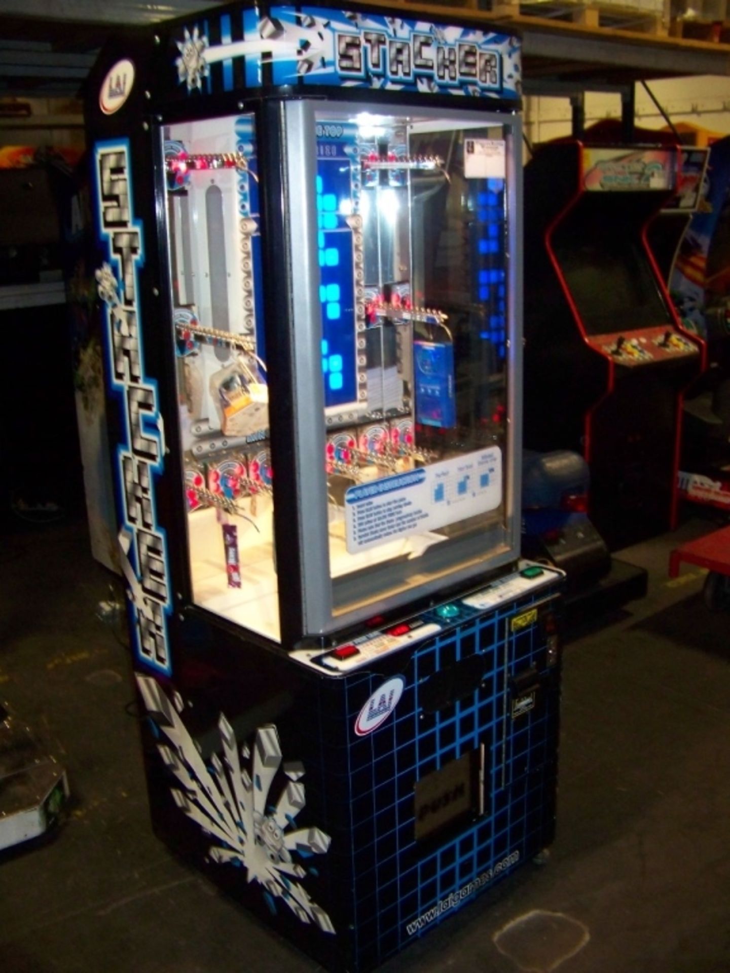 STACKER CLUB BLUE PRIZE REDEMPTION GAME LAI GAMES Item is in used condition. Evidence of wear and