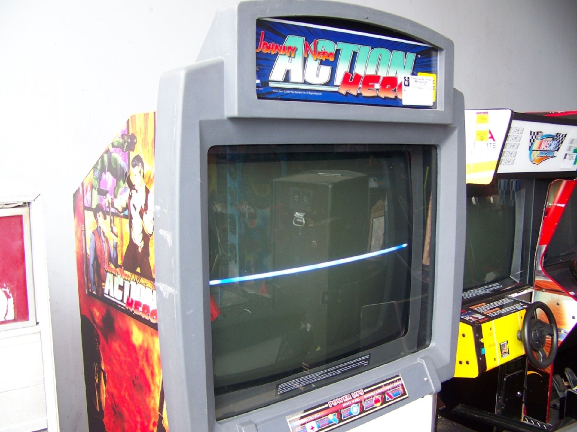 JOHNNY NERO ACTION HERO SHOWCASE 39"" ARCADE GAME Item is in used condition. Evidence of wear and - Image 2 of 3
