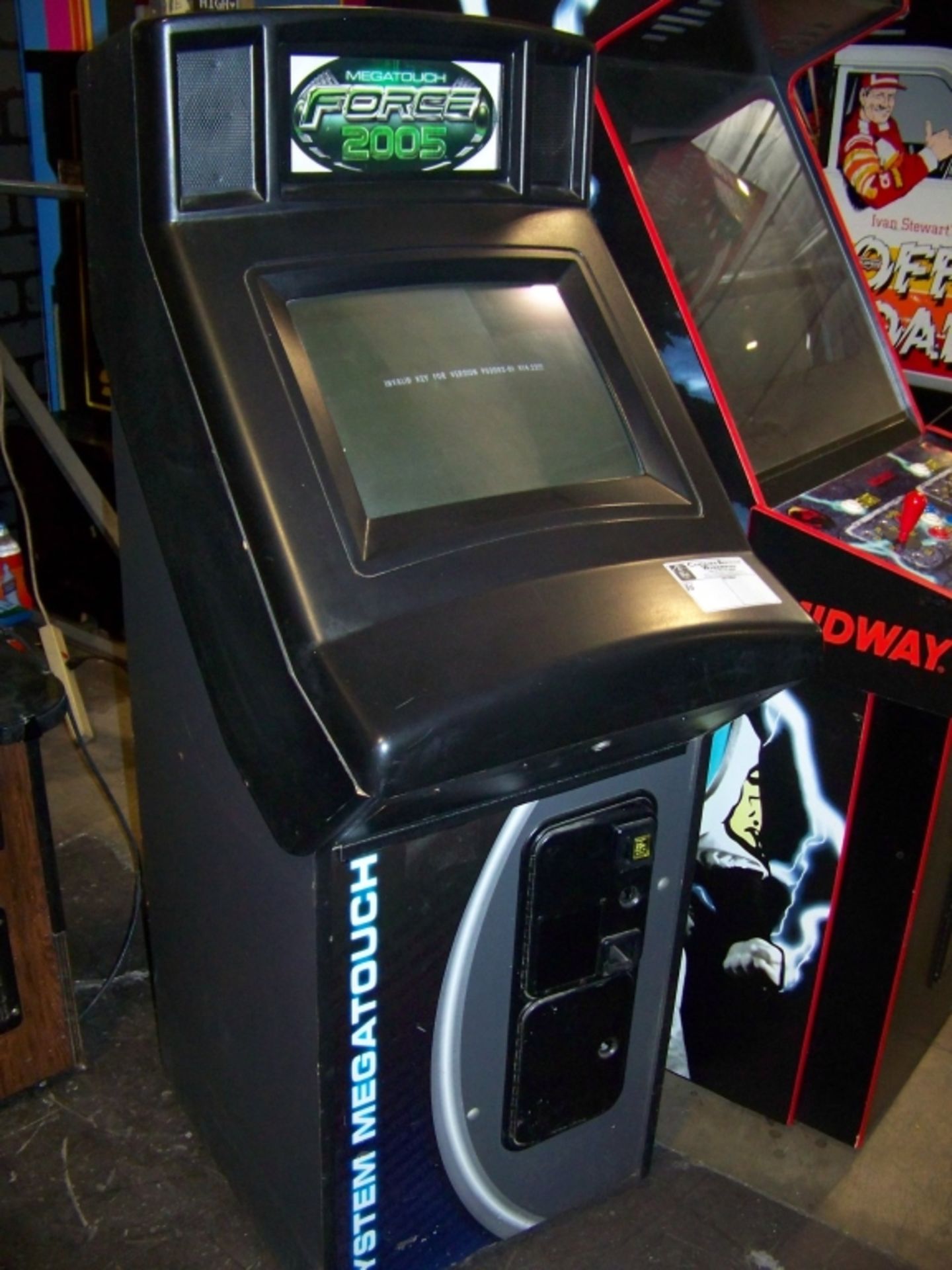 MEGATOUCH FORCE 2005 UPRIGHT ARCADE GAME Item is in used condition. Evidence of wear and