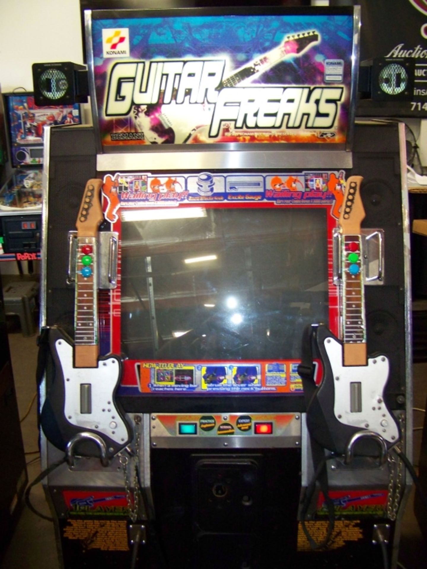 GUITAR FREAKS KONAMI MUSIC ARCADE GAME Item is in used condition. Evidence of wear and commercial