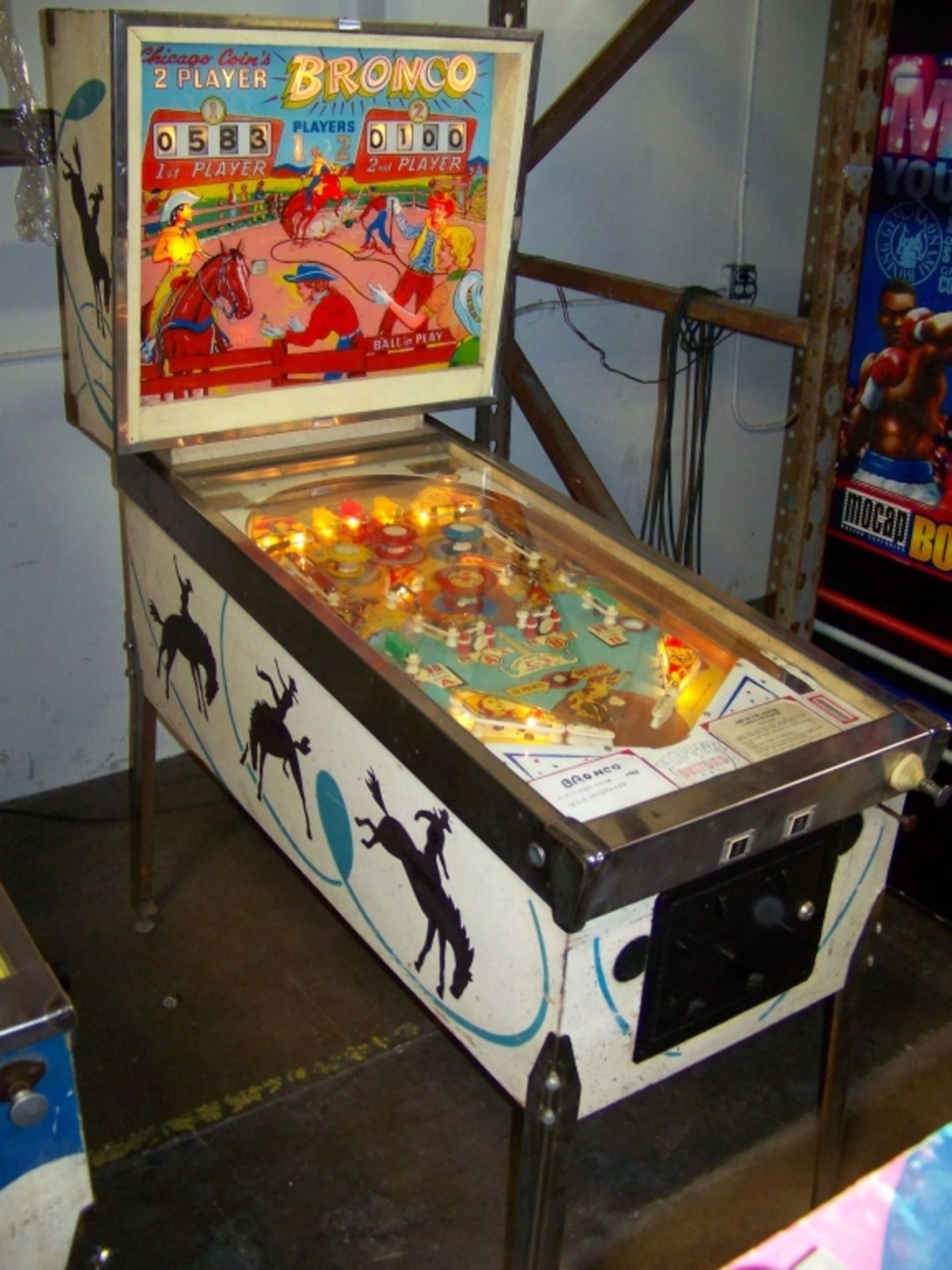 BRONCO PINBALL MACHINE CHICAGO COIN 1963 Item is in used condition. Evidence of wear and