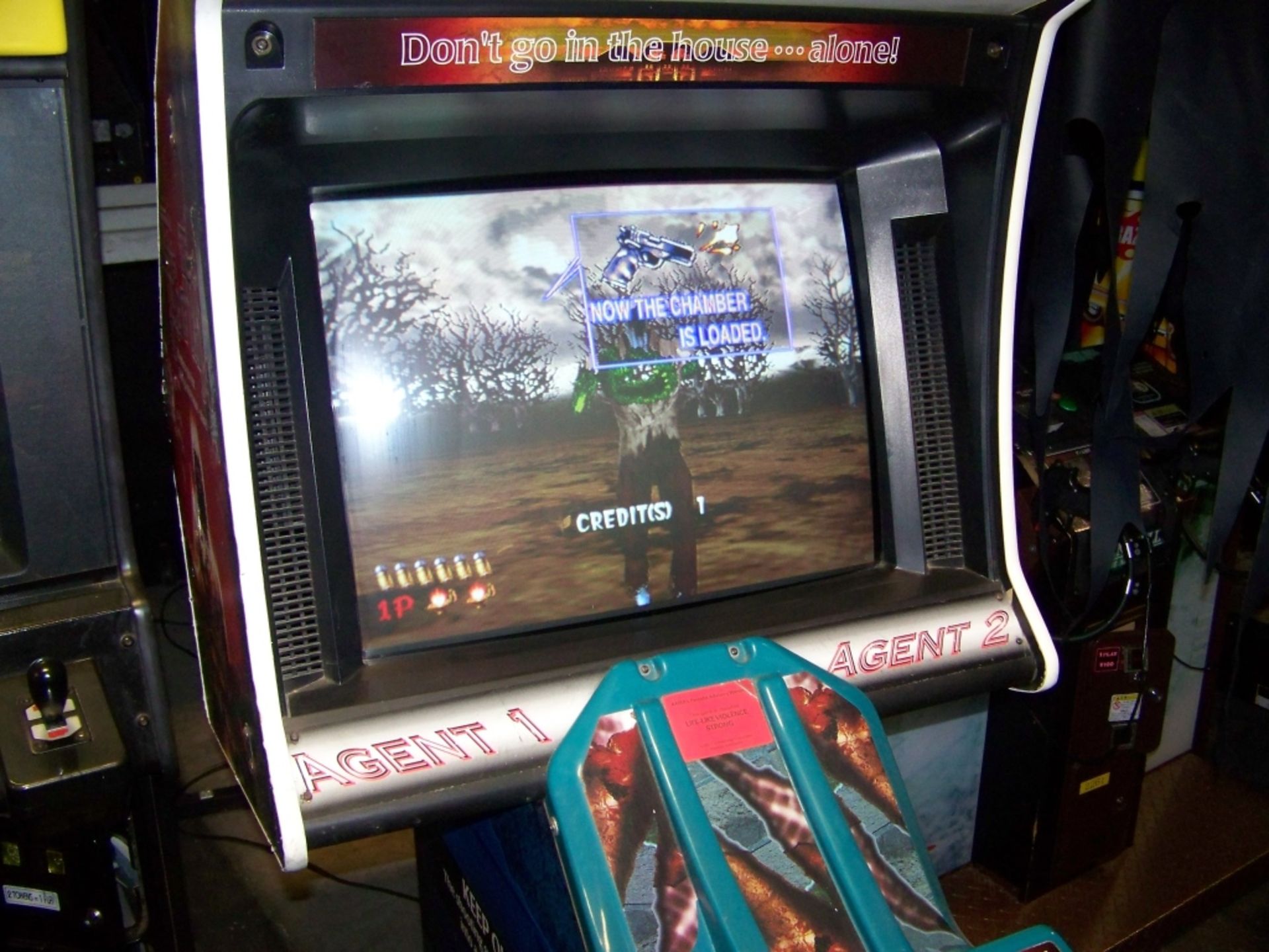 THE HOUSE OF THE DEAD ZOMBIE SHOOTER ARCADE GAME Item is in used condition. Evidence of wear and - Image 9 of 9