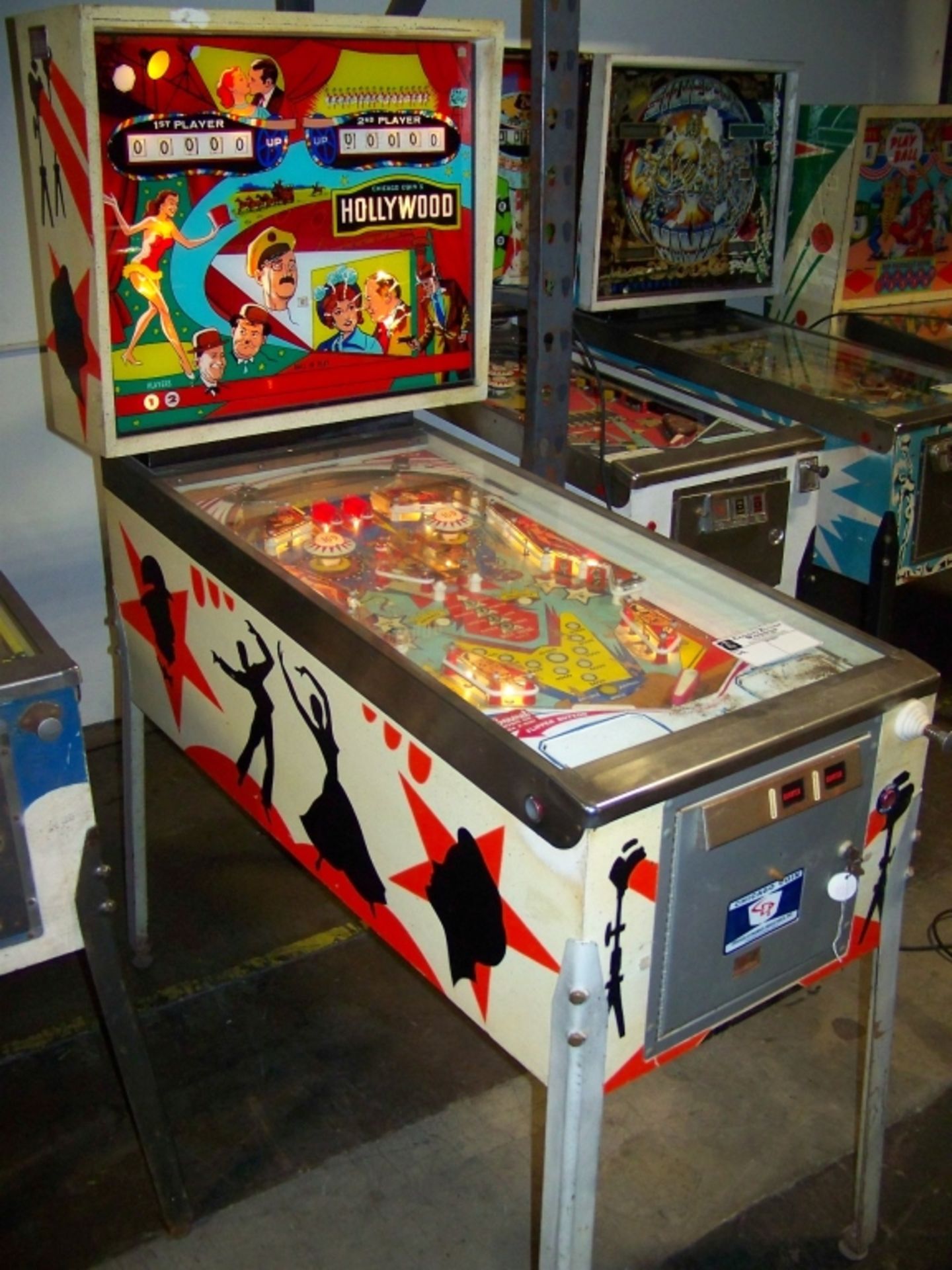 HOLLYWOOD PINBALL MACHINE CHICAGO COIN 1976 Item is in used condition. Evidence of wear and