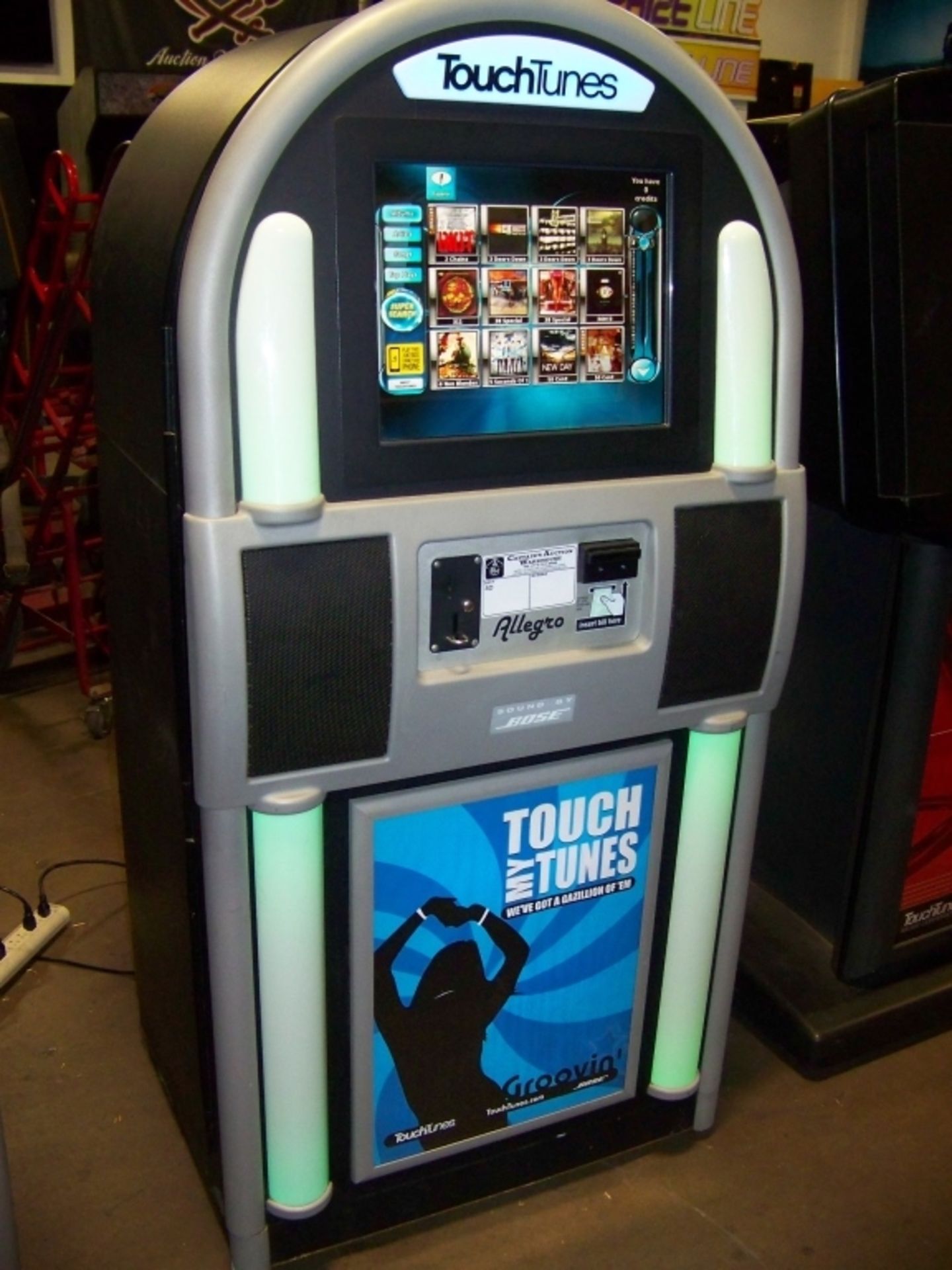 TOUCH TUNES ALLEGRO FLOOR MODEL DIGITAL JUKEBOX Item is in used condition. Evidence of wear and